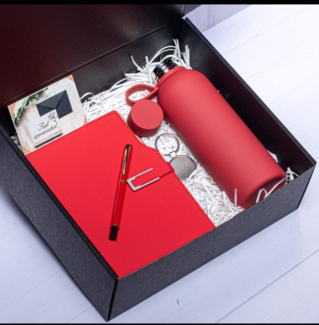 Executive 4 in 1 gift set
Thermal insulated Flask-500 mls
Notebook
Executive signature pen
Key holder