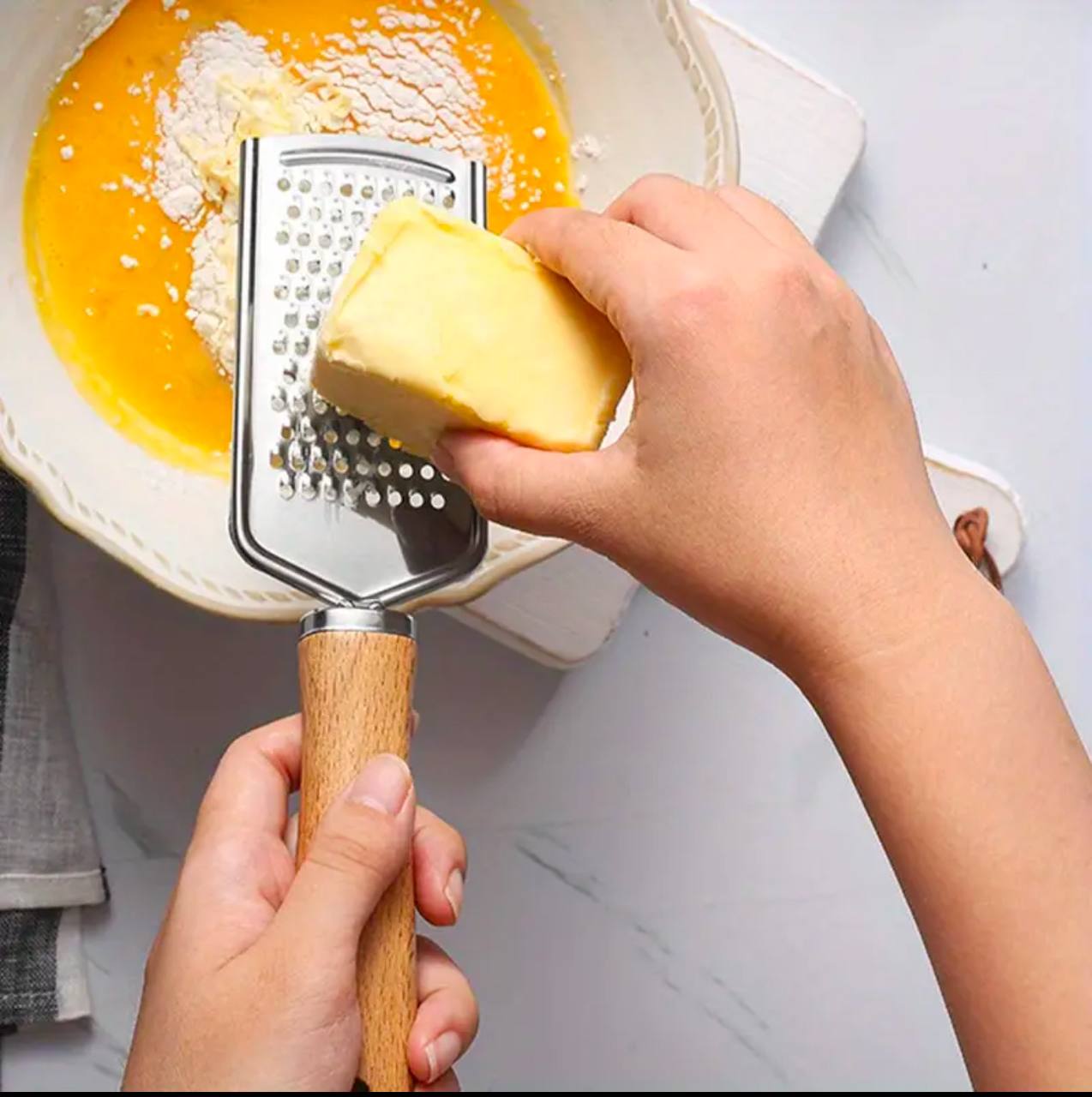 Stainless steel multipurpose grater
With wooden handle