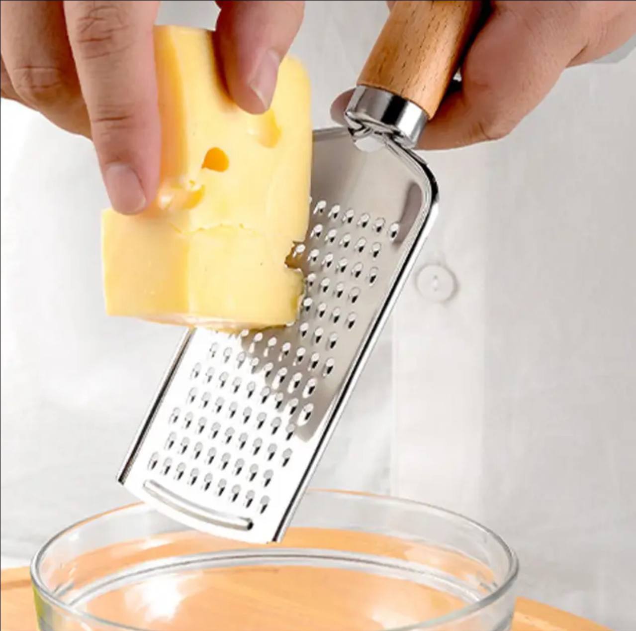 Stainless steel multipurpose grater
With wooden handle