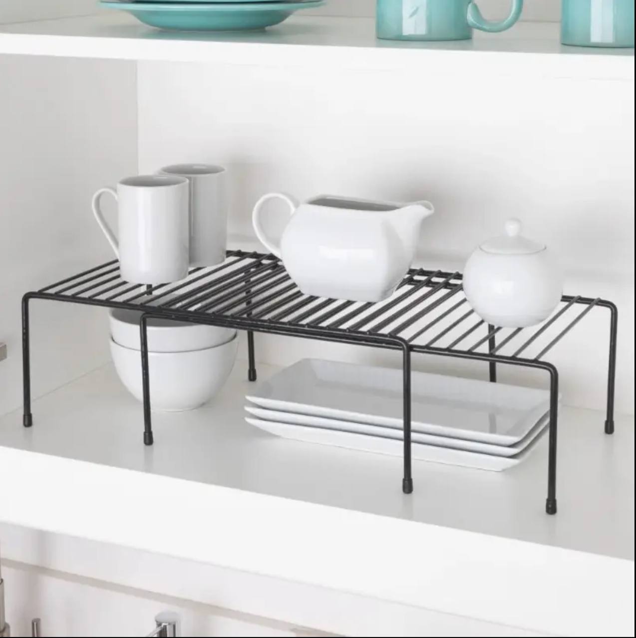 Expandable shelf raiser
