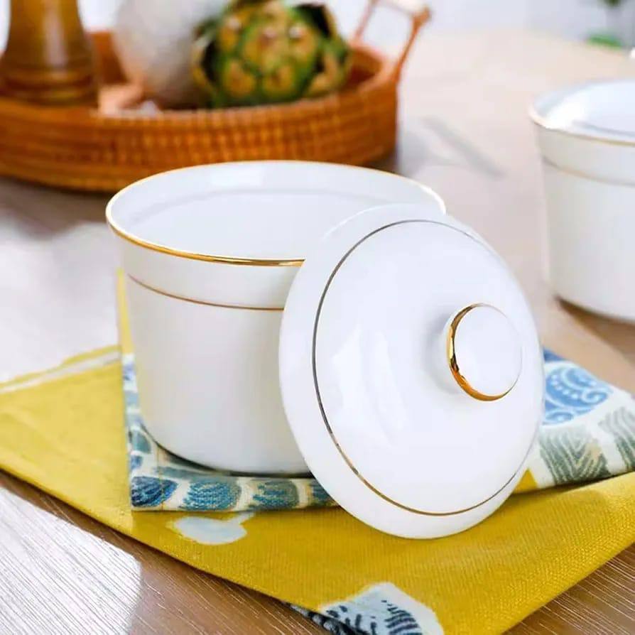 Ceramic sugar dish white with gold ring.