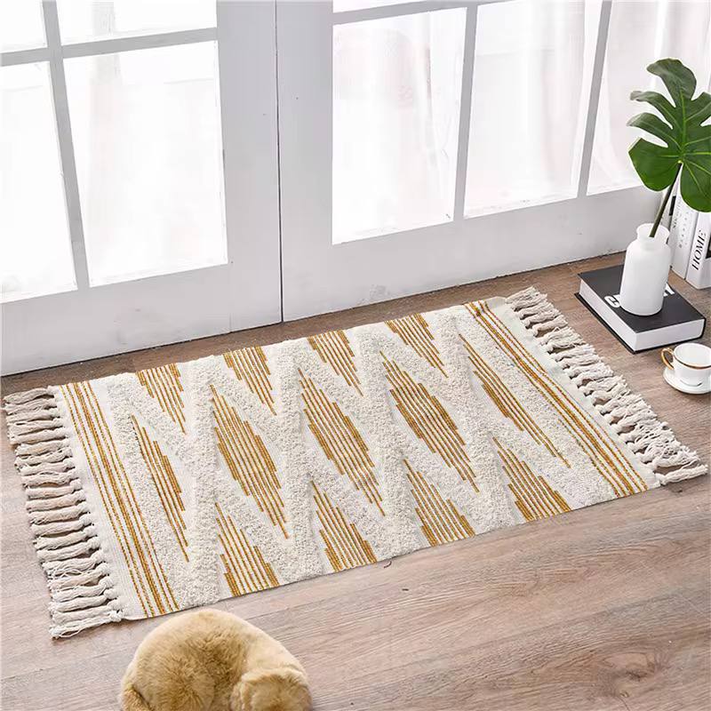 Bohemian Nordic style bedroom rug with tassels