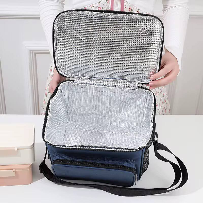 Large capacity 2 compartment lunch bag .