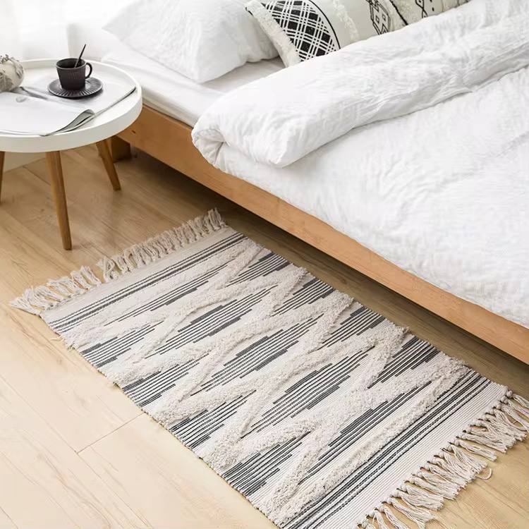 Bohemian Nordic style bedroom rug with tassels