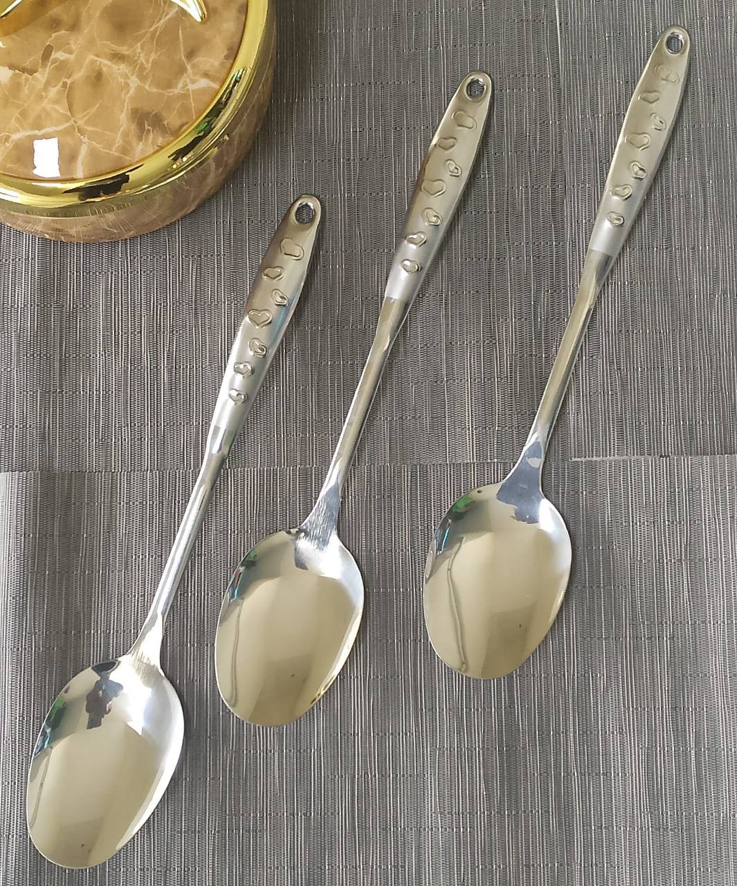 love handle Stainless steel silver serving spoon