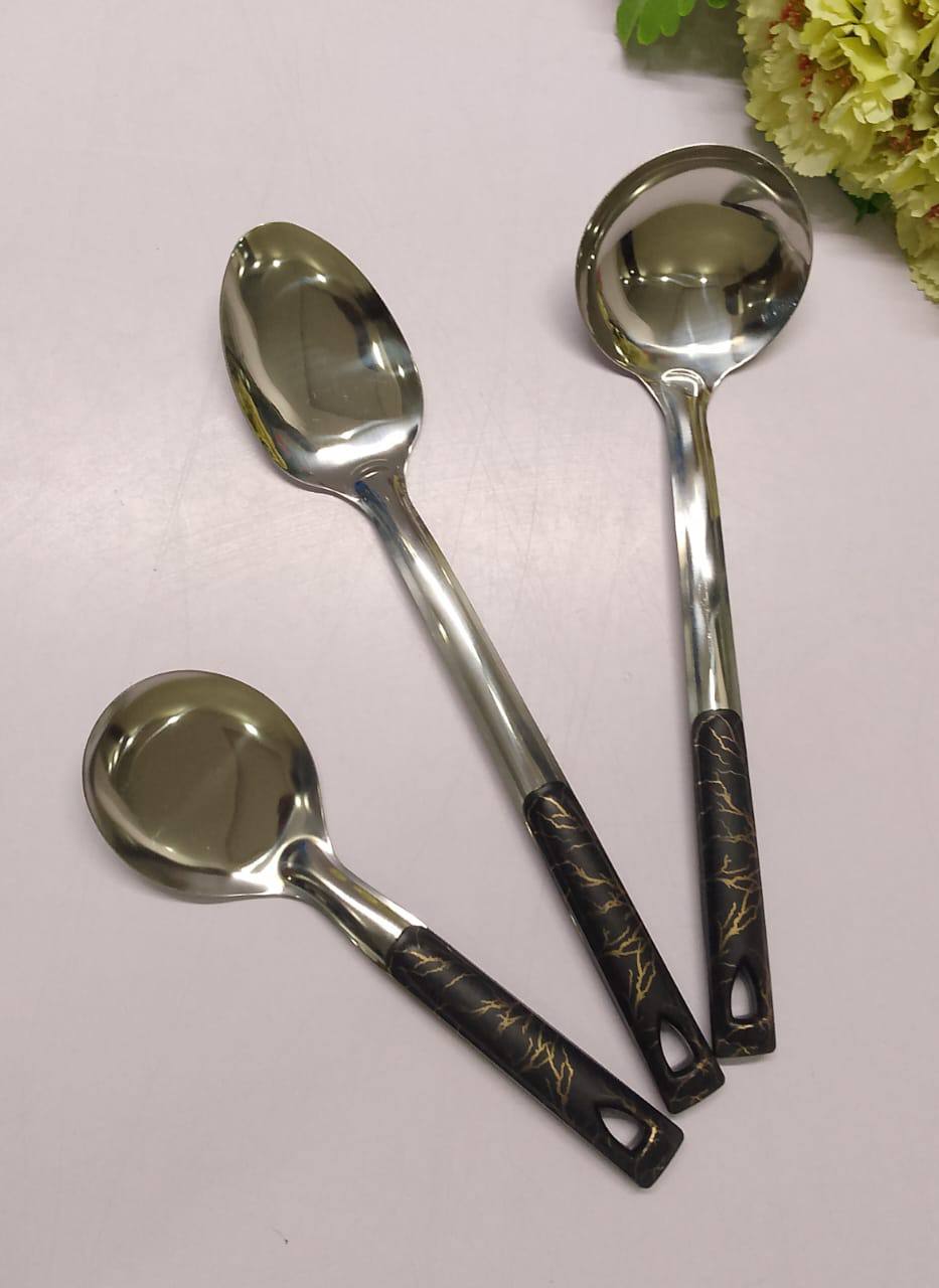 Stainless steel silver serving spoon with green in black marble like handle