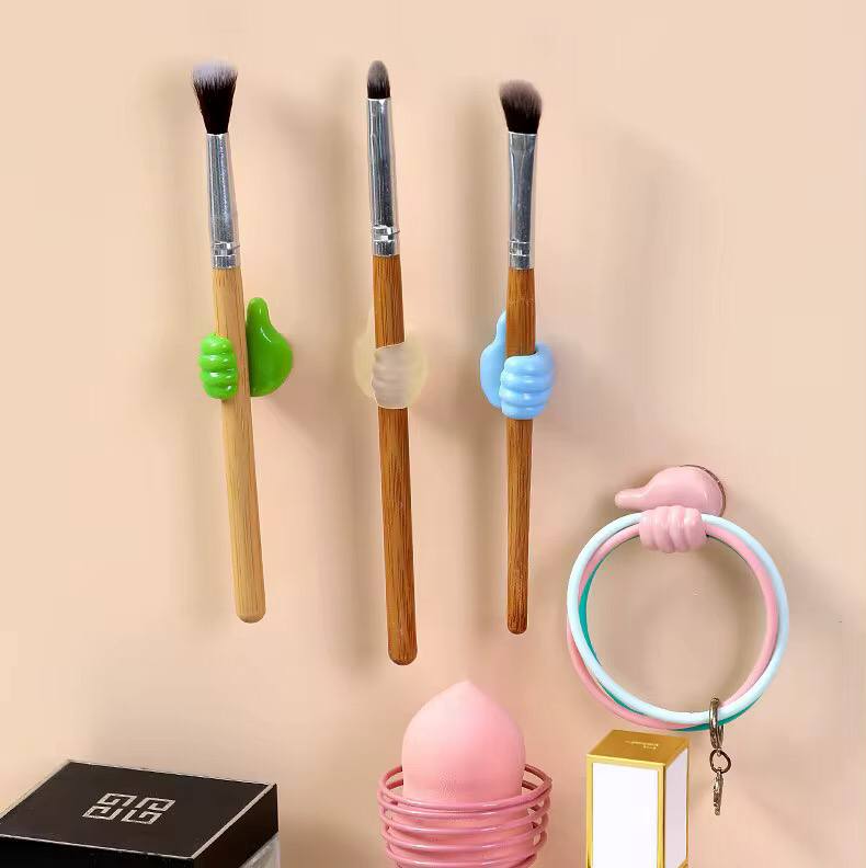 Thumb holders