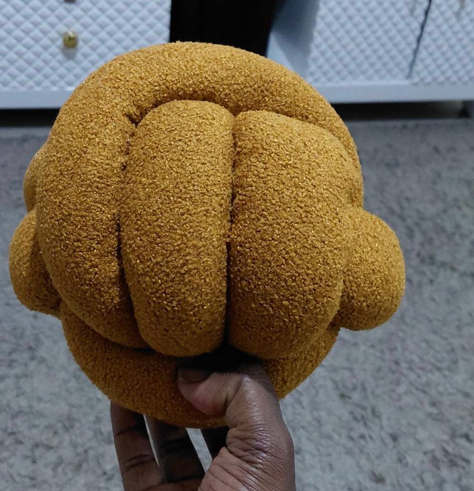 Fluffy Knot Throw Pillows