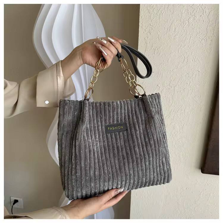 Suede detailed ladies shoulder tote bag