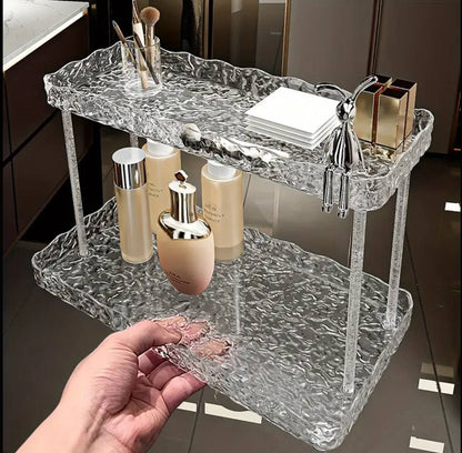 Two tier crystal-like makeup organizer.
