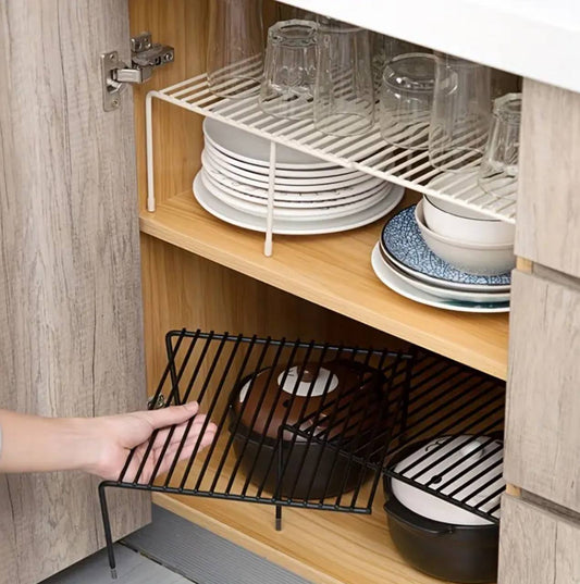 Expandable shelf raiser
