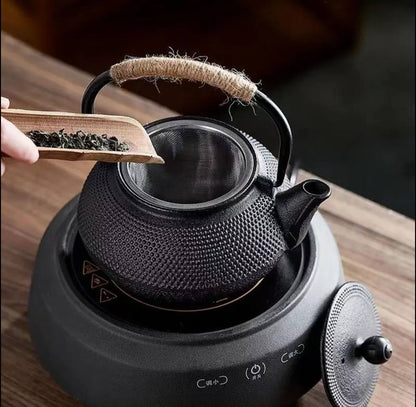Original heavy duty cast iron tea pot with infuser, cast iron coaster and spoon