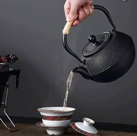 Original heavy duty cast iron tea pot with infuser, cast iron coaster and spoon