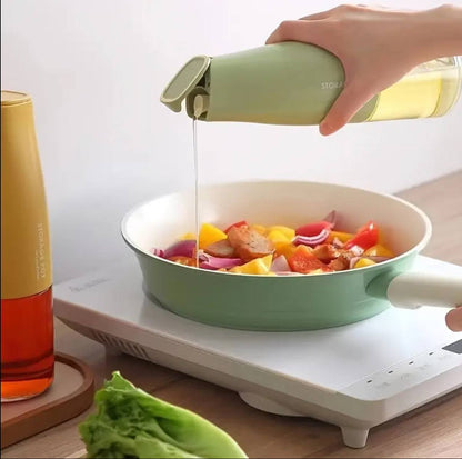Automatic oil dispenser