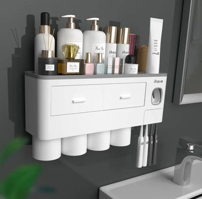 Wall mounting toothpaste dispenser with magnetic cups