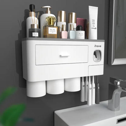 Wall mounting toothpaste dispenser with magnetic cups