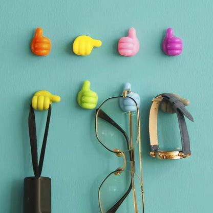 Self adhesive thumb hooks