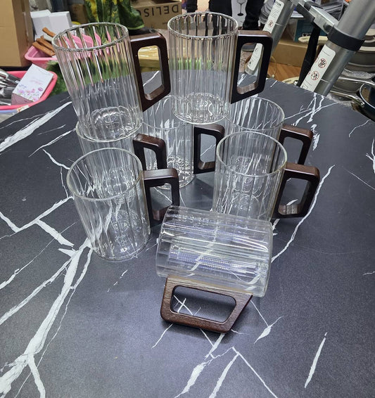 350ml Unique Elegant Glass Mugs.
High Borosilicate Tea/Coffee Cup glass with walnut wooden Handle.
Heat resistance.