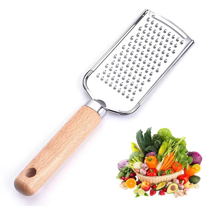 Stainless steel multipurpose grater 
With wooden handle