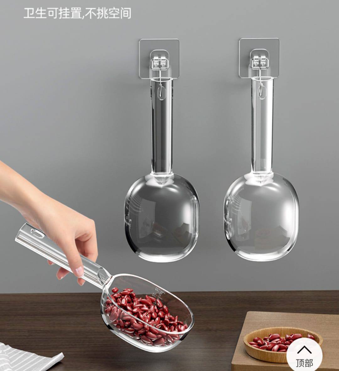 Acrylic  scoop with a long handle and clearly marked measurements