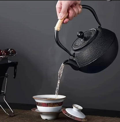 Original heavy duty cast iron tea pot with infuser, cast iron coaster and spoon