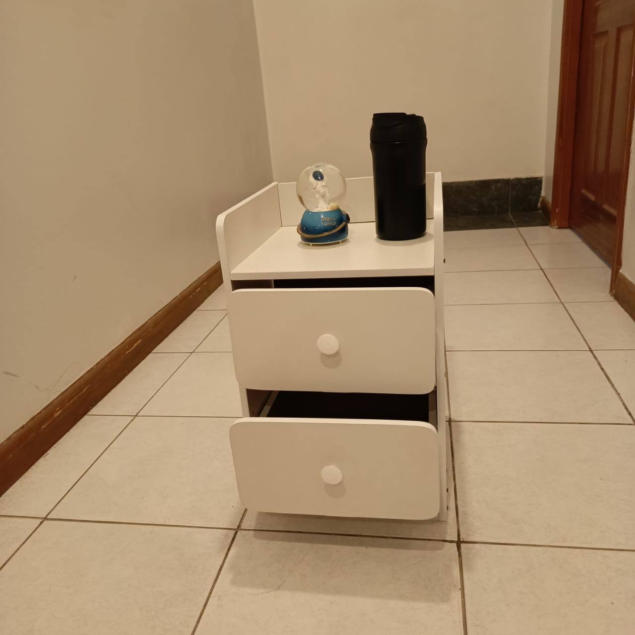 Minimalist wooden bedside table with drawer