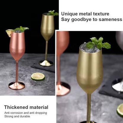 A pair of Gold Stainless steel wine glass