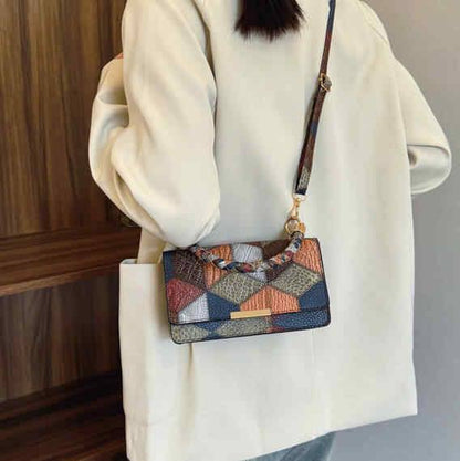 Fashionable multicolored diamond sling bag