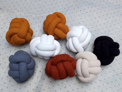 Fluffy Knot Throw Pillows