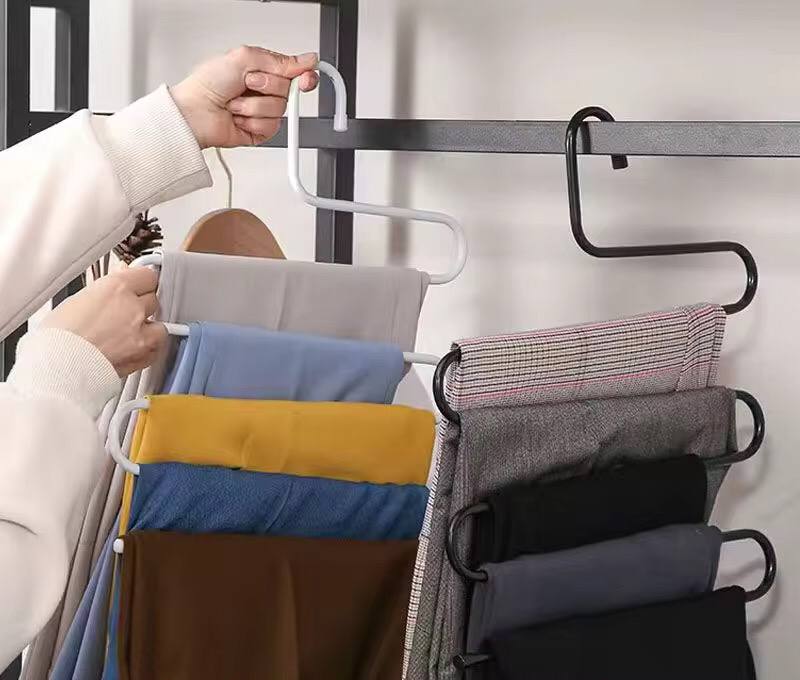 Black and white trouser hangers