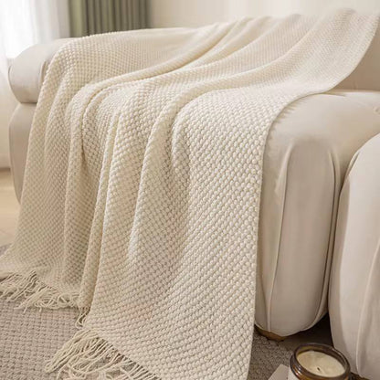 Knitted throw blanket