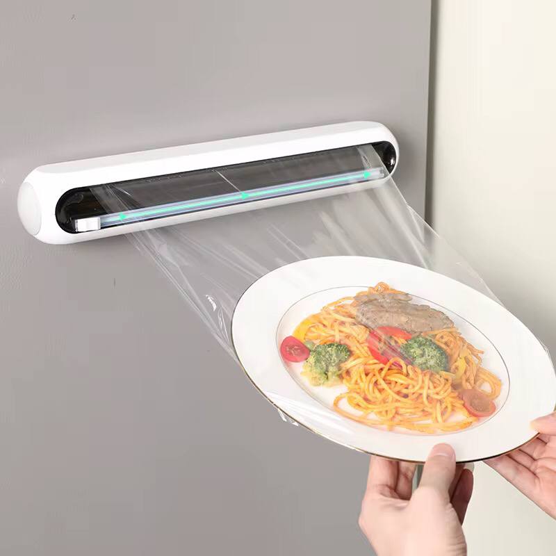 Plastic wrap cutter / cling film dispenser