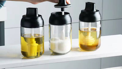 Glass jar with dipper