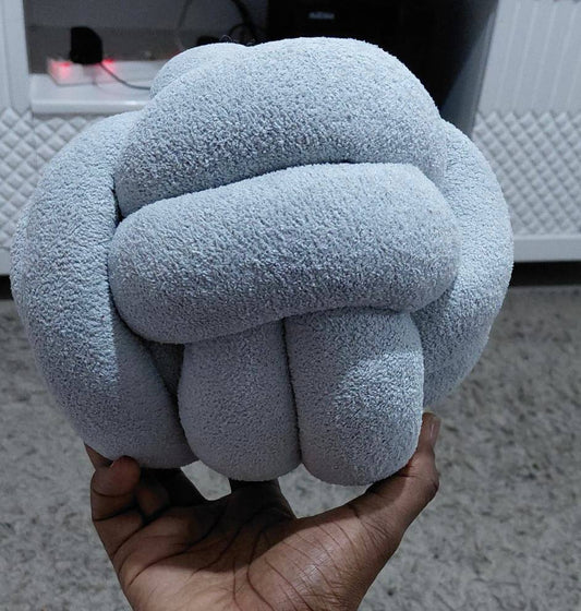 Fluffy Knot Throw Pillows