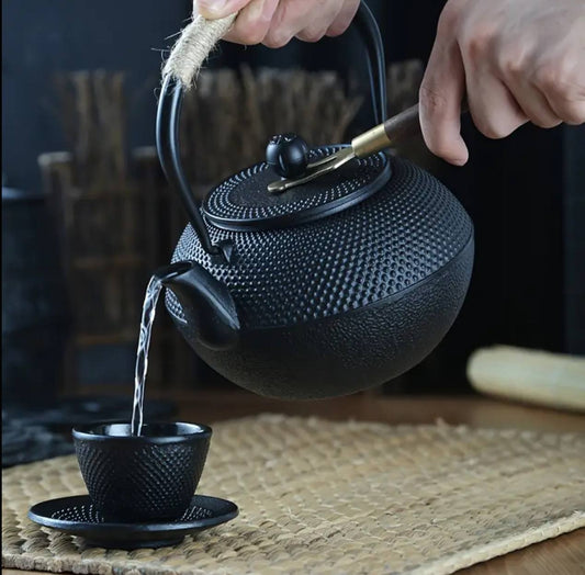 Original heavy duty cast iron tea pot with infuser, cast iron coaster and spoon