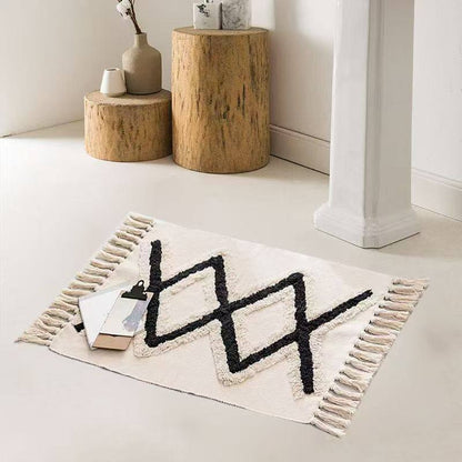 Bohemian Nordic style bedroom rug with tassels