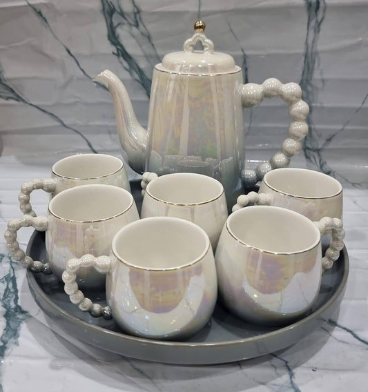 Fine ceramic 8pc Rotating tray tea set with 6 cups and kettle