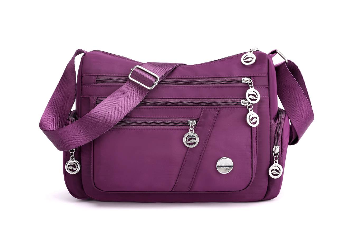 Multi-comnartment cross body bag