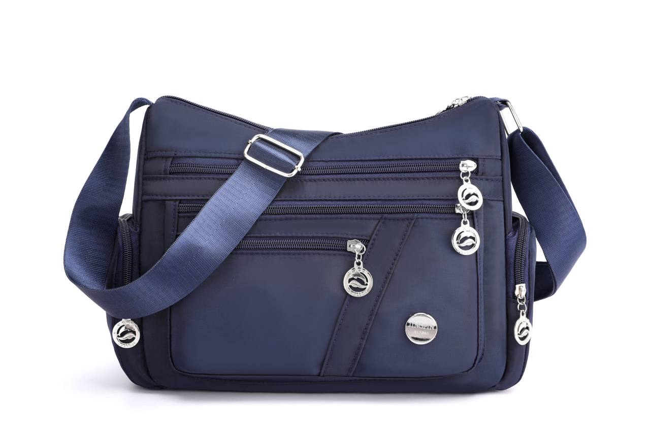 Multi-comnartment cross body bag