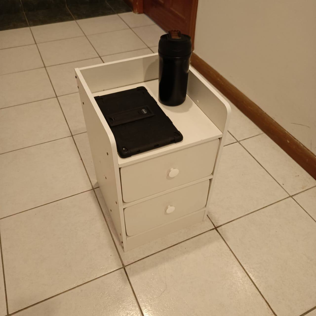 Minimalist wooden bedside table with drawer