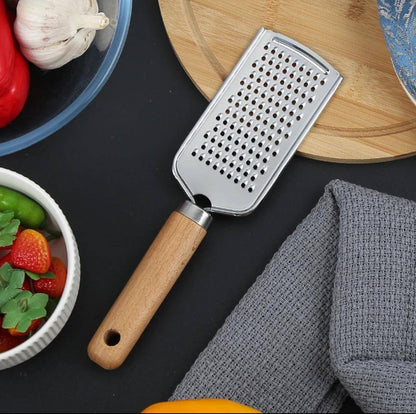Stainless steel multipurpose grater 
With wooden handle