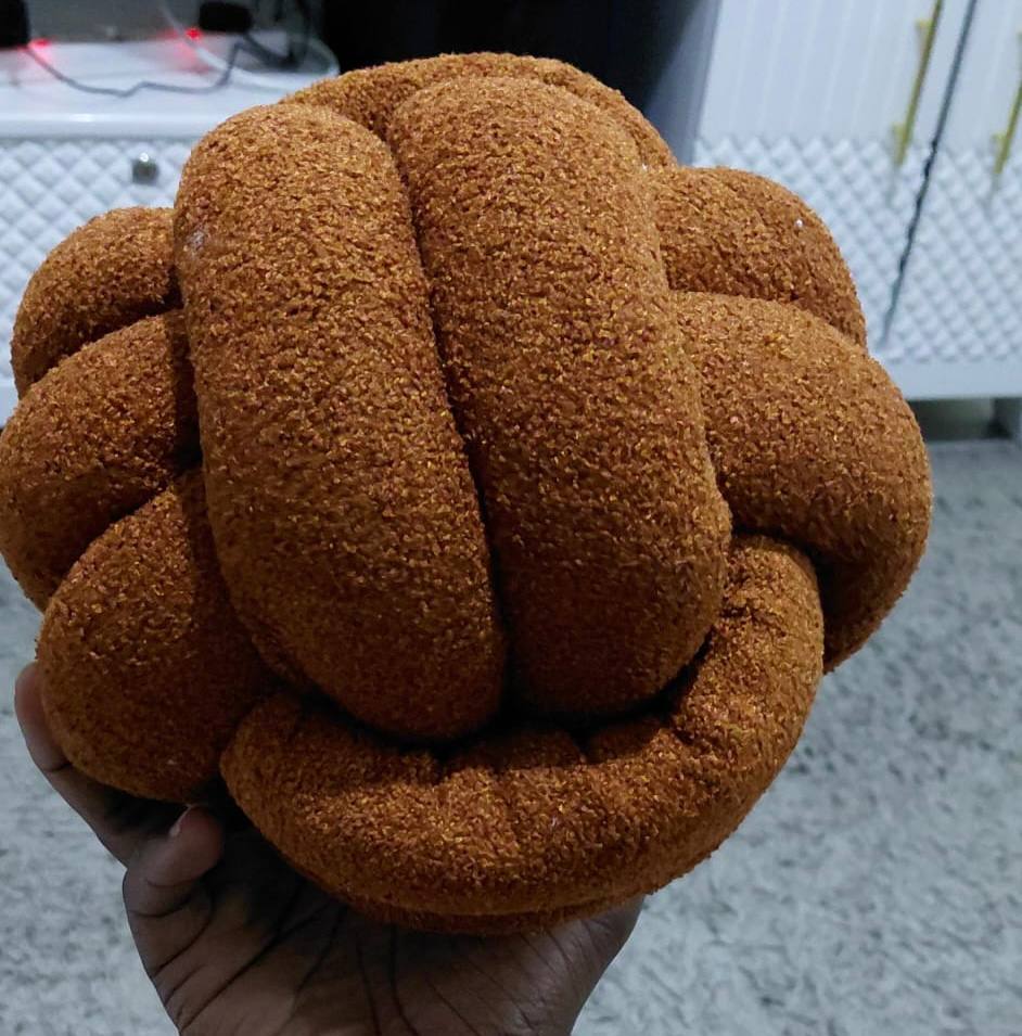 Fluffy Knot Throw Pillows