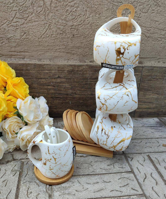 White marble cup with bamboo stand and coasters