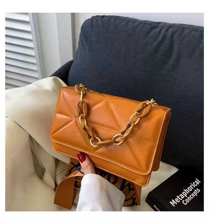 Mini Embossed Leather Sling Bag