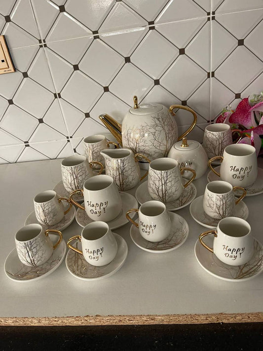 Tree Tea Set with palm tree design and gold touch.