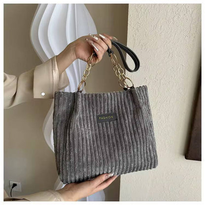 Suede detailed ladies shoulder tote bag
